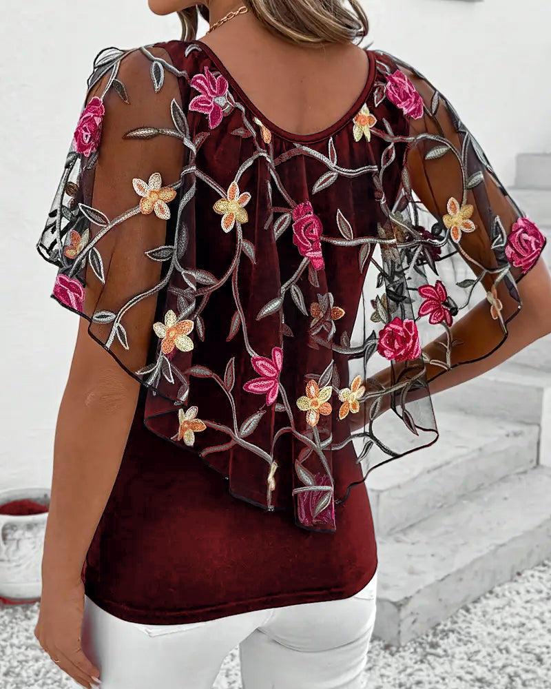 Elara – Bestickte Mesh-Bluse mit Statement-Ärmeln für elegante Layering-Looks